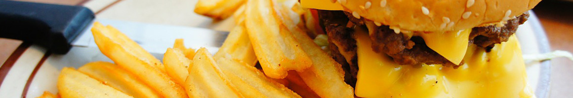 Eating Burger Fast Food at Bongo Burger restaurant in Berkeley, CA.